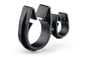 A rotatable dual routing clip that keeps two routings secured and separated.