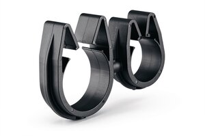 A rotatable dual routing clip that keeps two routings secured and separated.