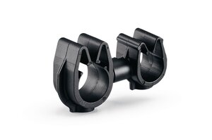 A rotatable dual routing clip that keeps two routings secured and separated.