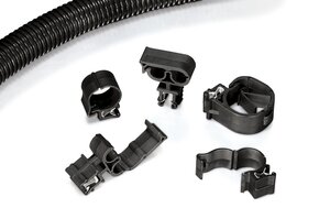 Os clips para cabos e tubos EdgeClip são adequados para o encaminhamento de cabos e tubos de baixa vibração com diâmetros de feixe maiores.
