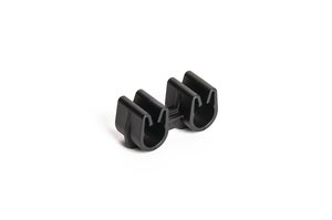 Dual pipe clip secures two routings together while keeping them separated, to prevent chafing or heat transfer.